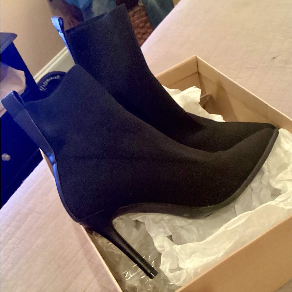 Lightly used Steve Madden Woman’s Black Boot (Ender) size 7.5